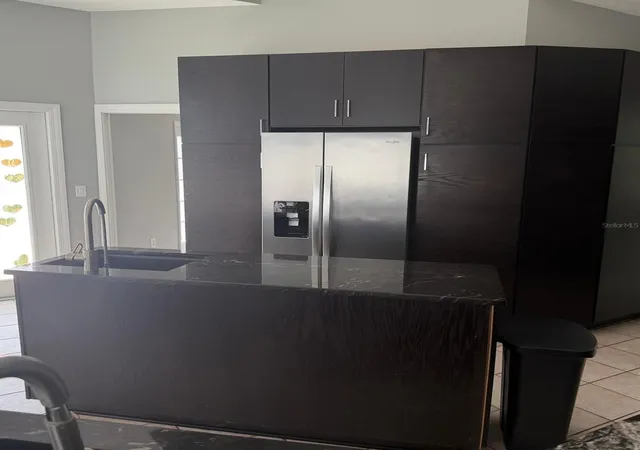 Photo 3 of Single family home for sale at 1931 Oak Ridge Ct, Clearwater, FL 33759 | MLS# TB8529045 | Listing updated on 2026-09-01