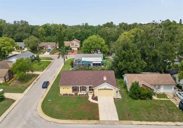 Photo 2 of Single family home for sale at 12301 Hounds Bay Row, Hudson, FL 34667 | MLS# W7887626 | Listing updated on 2026-07-21