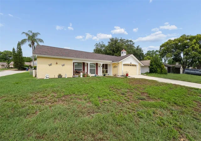 Photo 3 of Single family home for sale at 12301 Hounds Bay Row, Hudson, FL 34667 | MLS# W7887626 | Listing updated on 2026-07-21