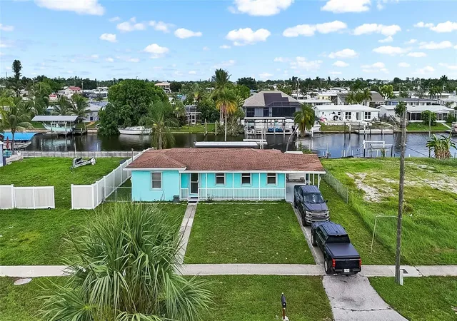 Photo 1 of Single family home for sale at 21748 Edgewater Dr, Port Charlotte, FL 33952 | MLS# O6425028 | Listing updated on 2026-08-06