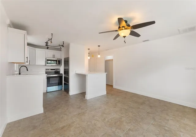 Listing Photo 3 - Condo for sale in building located at 14036 Marguerite Dr, MADEIRA BEACH, FL 33708