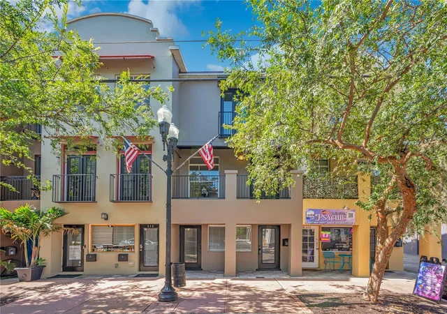 Photo 1 of Townhouse for sale at 828 E Washington St, Orlando, FL 32801 | MLS# O6425067 | Listing updated on 2026-08-27