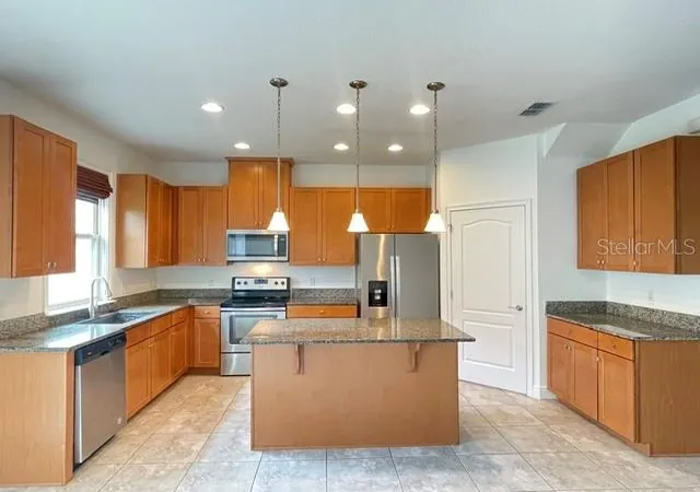 Photo 2 of Townhouse for sale at 13927 Arclid St, Orlando, FL 32832 | MLS# O6425098 | Listing updated on 2026-09-14