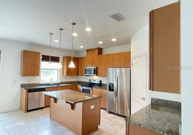 Photo 3 of Townhouse for sale at 13927 Arclid St, Orlando, FL 32832 | MLS# O6425098 | Listing updated on 2026-09-14