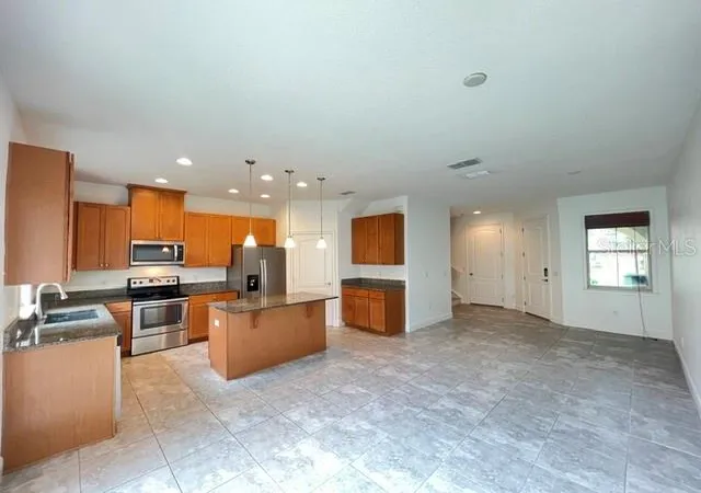 Photo 4 of Townhouse for sale at 13927 Arclid St, Orlando, FL 32832 | MLS# O6425098 | Listing updated on 2026-09-14