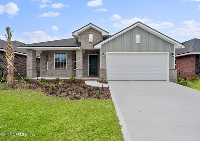 Photo 1 of Single family home for sale at 129 Pritchard Dr, Palm Coast, FL 32164 | MLS# FC319964 | Listing updated on 2026-10-03