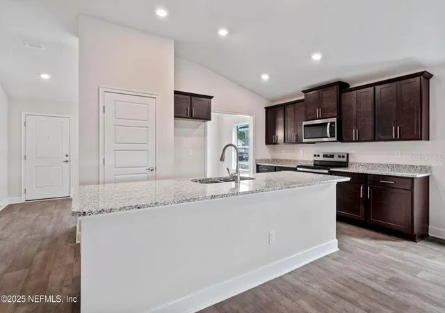 Photo 3 of Single family home for sale at 129 Pritchard Dr, Palm Coast, FL 32164 | MLS# FC319964 | Listing updated on 2026-10-03