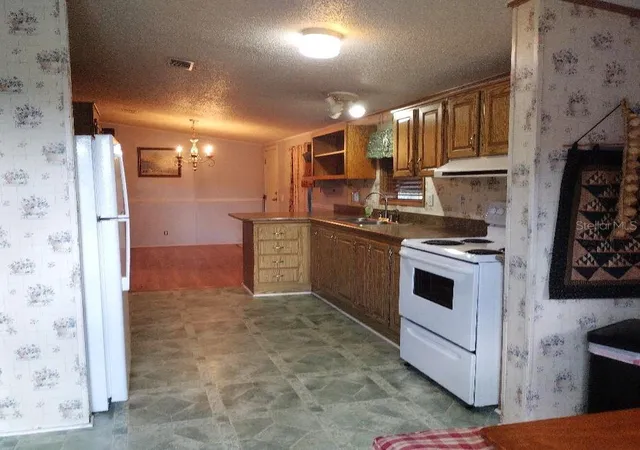 Photo 3 of Manufactured home for sale at 1176 County Rd 305, Bunnell, FL 32110 | MLS# FC319965 | Listing updated on 2026-10-17