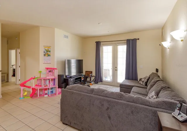 Photo 3 of Condo for sale at 3001 Laurel Run Ln #206, Kissimmee, FL 34741 | MLS# O6425116 | Listing updated on 2026-09-21
