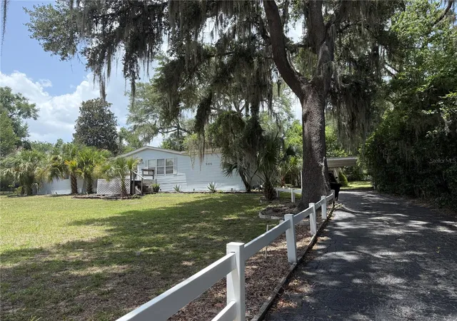 1st image of 265 W Mcclendon St, Lady Lake, FL 32159 | MLS# OM728487