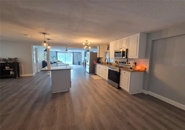 Photo 4 of Single family home for sale at 9820 Pocono St, Port Richey, FL 34668 | MLS# TB8529297 | Listing updated on 2026-08-27
