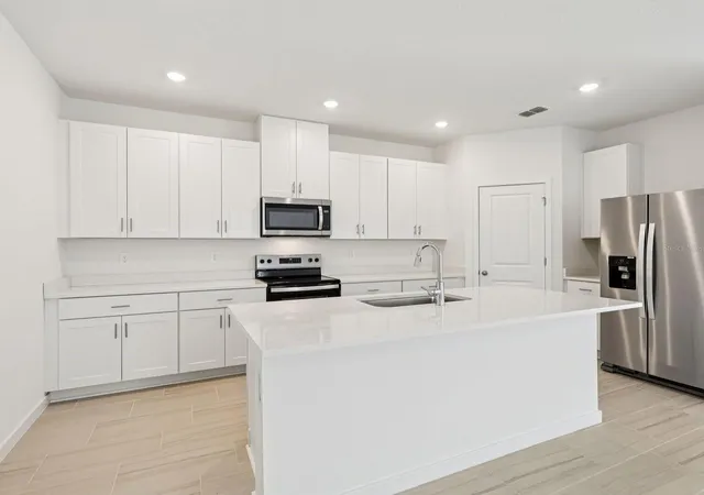 Photo 2 of Single family home for sale at 112 Wandering Crk Way, Palm Coast, FL 32164 | MLS# TB8529315 | Listing updated on 2026-08-17