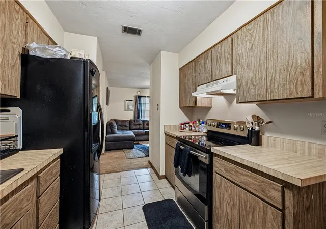 Photo 4 of Single family home for sale at 2902 NW 39th Place, Gainesville, FL 32605 | MLS# GC541968 | Listing updated on 2026-07-16