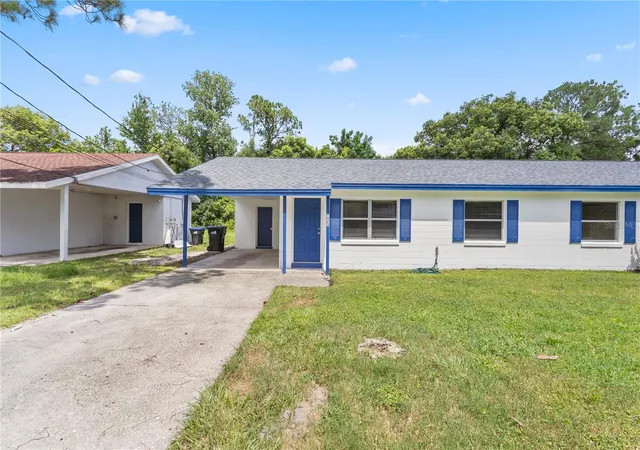 Photo 3 of Multi family home for sale at 1921 Bonneville Dr, Orlando, FL 32826 | MLS# O6425260 | Listing updated on 2026-09-29