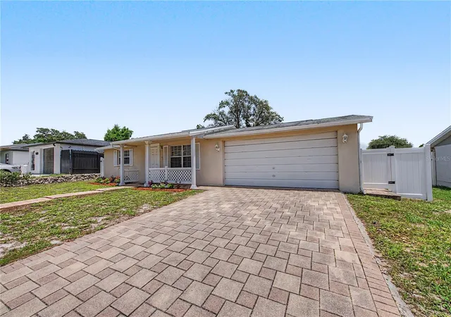 Photo 1 of Single family home for sale at 9830 Rainbow Ln, Port Richey, FL 34668 | MLS# TB8529453 | Listing updated on 2026-10-05