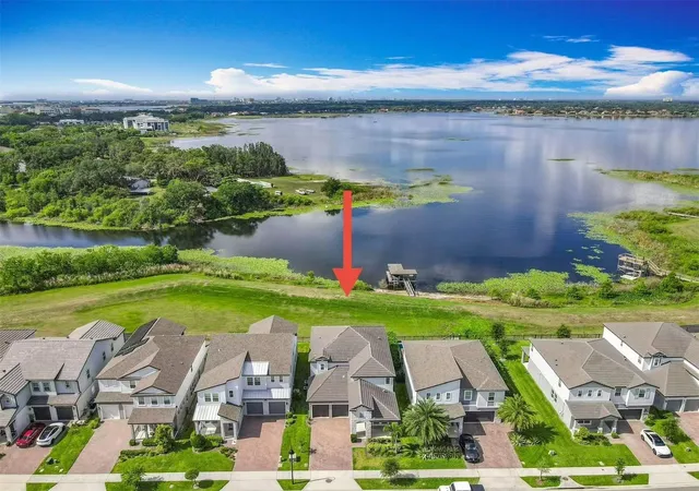 Photo 2 of Single family home for sale at 7398 Alpine Butterfly Ln, Orlando, FL 32819 | MLS# O6425283 | Listing updated on 2026-08-12