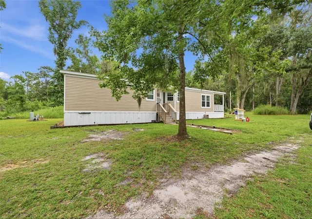 Photo 2 of Manufactured home for sale at 16184 Paxford Ln, Brooksville, FL 34601 | MLS# W7887670 | Listing updated on 2026-09-11
