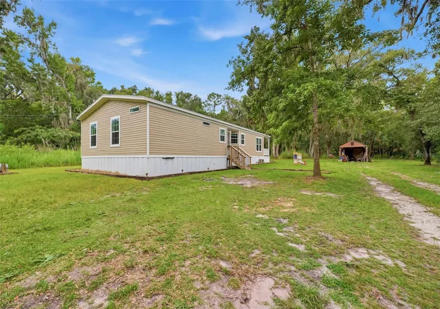Photo 3 of Manufactured home for sale at 16184 Paxford Ln, Brooksville, FL 34601 | MLS# W7887670 | Listing updated on 2026-09-11