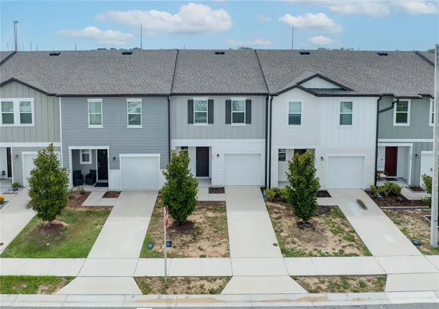 Photo 3 of Townhouse for sale at 221 Mandovi St, Davenport, FL 33837 | MLS# O6425315 | Listing updated on 2026-10-03