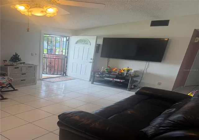 Photo 2 of Single family home for sale at 1304 Donwoods Ln, Royal Palm Beach, FL 33411 | MLS# O6425334 | Listing updated on 2026-07-16