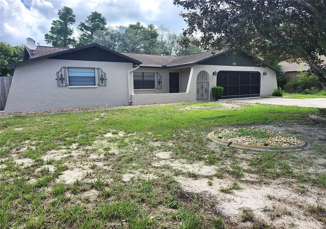 Photo 2 of Single family home for sale at 2354 Deltona Blvd, Spring Hill, FL 34606 | MLS# W7887678 | Listing updated on 2026-08-21