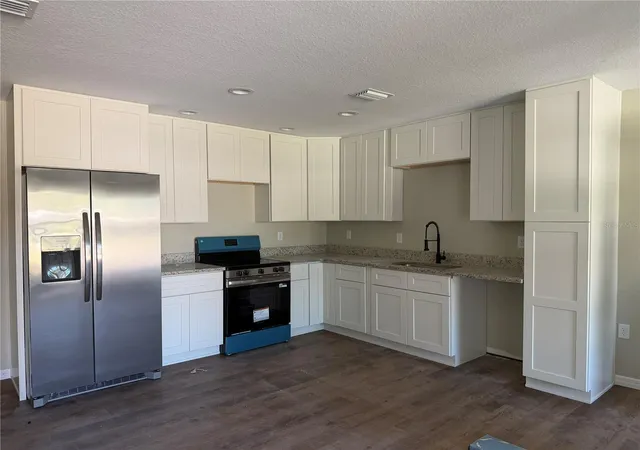 Photo 2 of Single family home for sale at 13797 SE 40th Court, Summerfield, FL 34491 | MLS# OM728539 | Listing updated on 2026-10-22