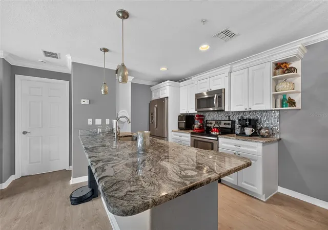 Photo 3 of Condo for sale at 6420 Banyan Blvd #201, New Port Richey, FL 34652 | MLS# TB8529589 | Listing updated on 2026-10-22