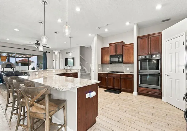 Photo 3 of Single family home for sale at 3335 Stonegate Fls Dr, Land O Lakes, FL 34638 | MLS# TB8529623 | Listing updated on 2026-10-07