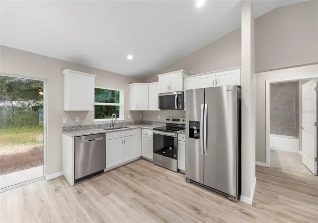 Photo 3 of Single family home for sale at 14703 Sw 23rd Place, Ocala, FL 34481 | MLS# OM728562 | Listing updated on 2026-07-25