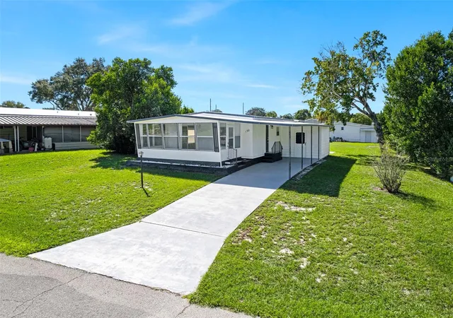 Photo 1 of Manufactured home for sale at 130 Florence Blvd, Debary, FL 32713 | MLS# O6425493 | Listing updated on 2026-10-07