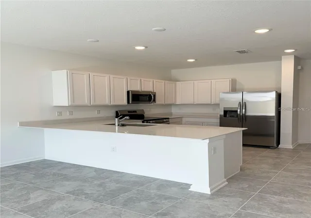 Photo 3 of Townhouse for sale at 2452 Skyline Loop, Kissimmee, FL 34758 | MLS# S5153808 | Listing updated on 2026-08-21