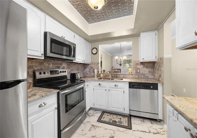4th image of 1001 Pine Isle Ln, Naples, FL 34112