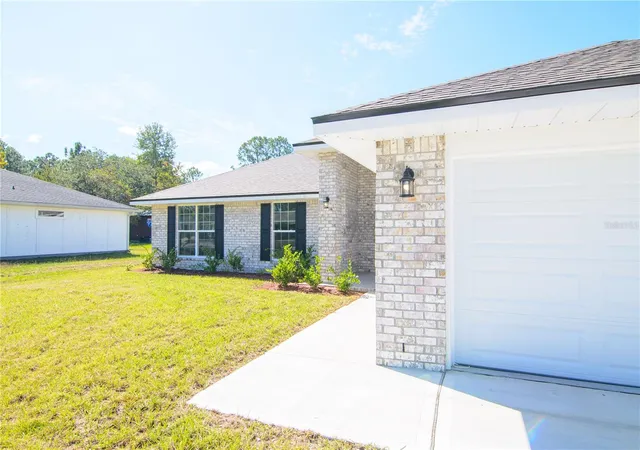 Photo 2 of Single family home for sale at 57 Radcliffe Dr, Palm Coast, FL 32164 | MLS# FC319993 | Listing updated on 2026-08-05