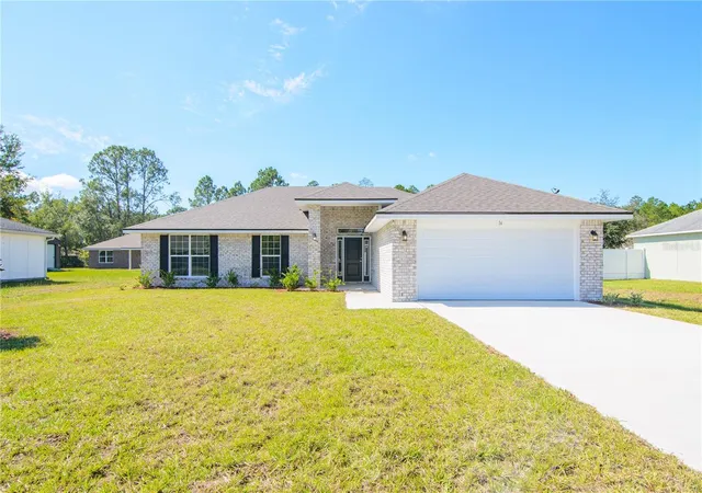 Photo 3 of Single family home for sale at 57 Radcliffe Dr, Palm Coast, FL 32164 | MLS# FC319993 | Listing updated on 2026-08-05