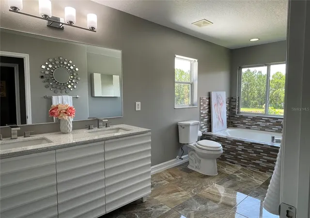 Photo 3 of Single family home for sale at 5036 Whistling Pines Ct, Wesley Chapel, FL 33545 | MLS# TB8529722 | Listing updated on 2026-10-05