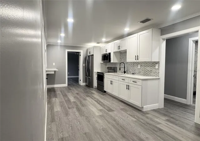 Photo 3 of Single family home for sale at 425 S Observatory Dr, Orlando, FL 32835 | MLS# O6425561 | Listing updated on 2026-09-12