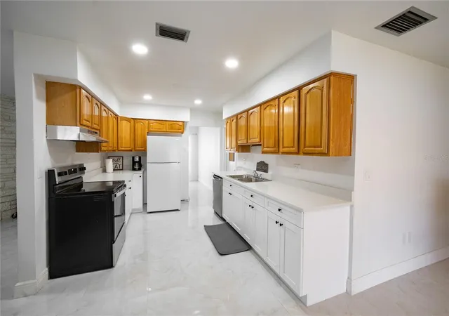 Photo 4 of Single family home for sale at 8413 Millwood Dr, Tampa, FL 33615 | MLS# TB8529755 | Listing updated on 2026-08-02