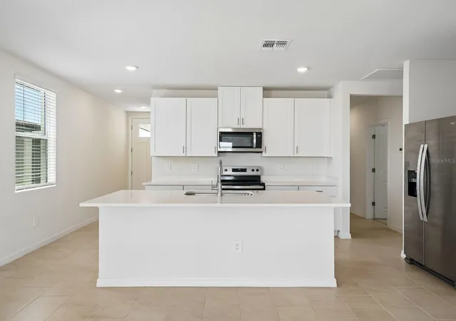 Photo 4 of Single family home for sale at 11353 Bellewood Ter, Parrish, FL 34219 | MLS# TB8529781 | Listing updated on 2026-10-10