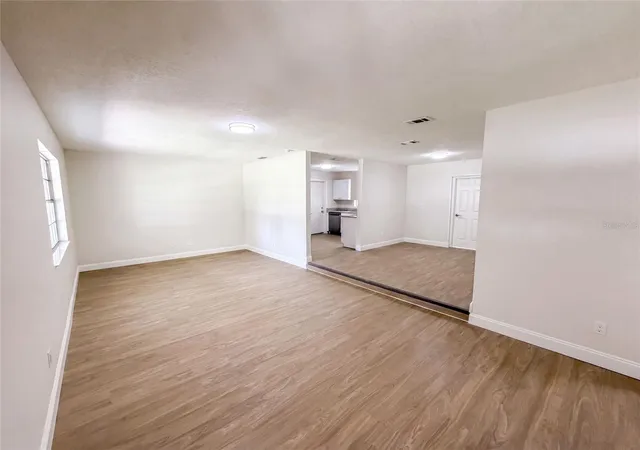 Photo 3 of Single family home for sale at 585 Hewett Dr, Orlando, FL 32807 | MLS# O6425605 | Listing updated on 2026-09-25