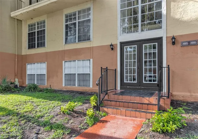 Photo 1 of Condo for sale at 3987 Versailles Dr #3987F, Orlando, FL 32808 | MLS# O6425637 | Listing updated on 2026-09-17