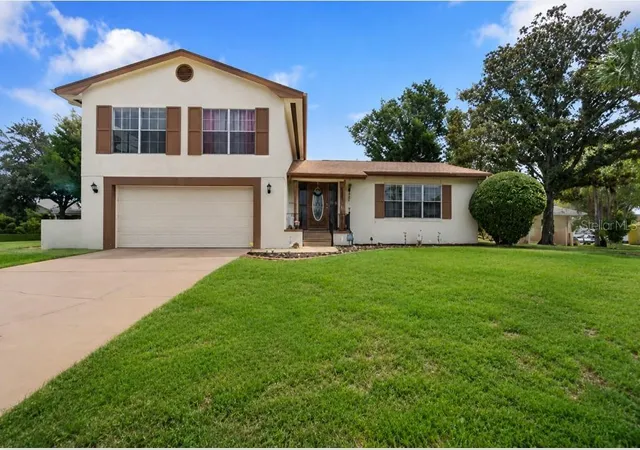 Photo 1 of Single family home for sale at 8609 Village Ml Row, Hudson, FL 34667 | MLS# W7887716 | Listing updated on 2026-09-22