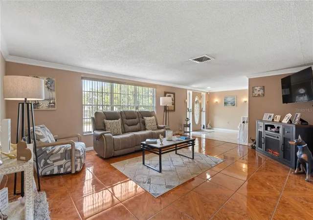 Photo 3 of Single family home for sale at 8609 Village Ml Row, Hudson, FL 34667 | MLS# W7887716 | Listing updated on 2026-09-22
