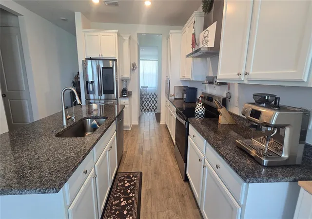 Photo 4 of Single family home for sale at 12163 Stirrup Dr, Dade City, FL 33525 | MLS# TB8529907 | Listing updated on 2026-08-11