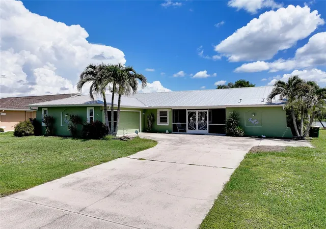 Photo 2 of Single family home for sale at 22234 Tennyson Ave, Port Charlotte, FL 33954 | MLS# A4700240 | Listing updated on 2026-07-21