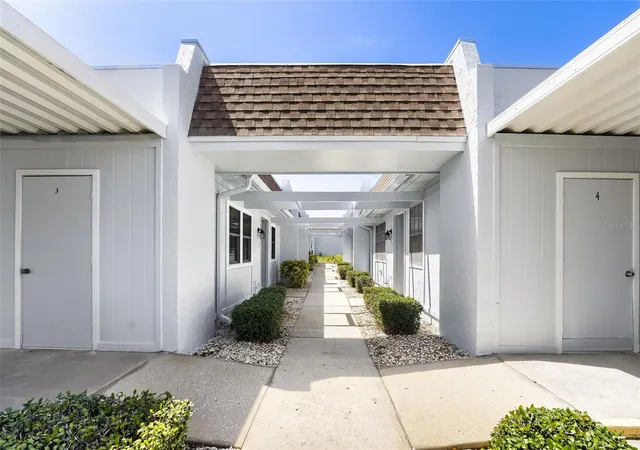 Photo 2 of Condo for sale at 11210 Carriage Hl Dr #6, Port Richey, FL 34668 | MLS# TB8529974 | Listing updated on 2026-09-14