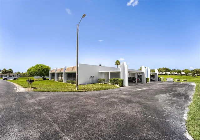 Photo 3 of Condo for sale at 11210 Carriage Hl Dr #6, Port Richey, FL 34668 | MLS# TB8529974 | Listing updated on 2026-09-14