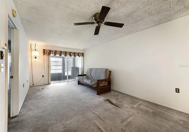 Photo 3 of Condo for sale at 11210 Carriage Hl Dr #6, Port Richey, FL 34668 | MLS# TB8529974 | Listing updated on 2026-09-14