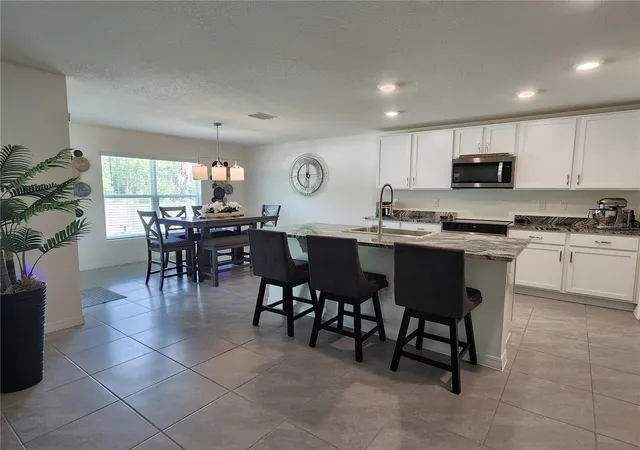 Photo 5 of Single family home for sale at 7238 SW 136th Lane, Ocala, FL 34473 | MLS# OM728649 | Listing updated on 2026-07-17