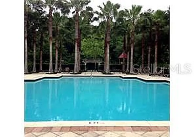 Photo 1 of Townhouse for sale at 705 Centervale Dr, Kissimmee, FL 34747 | MLS# O6425893 | Listing updated on 2026-09-21