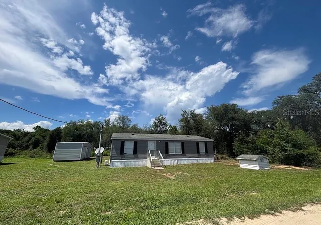 Photo 1 of Manufactured home for sale at 15299 Ne 238th Street, Fort Mc Coy, FL 32134 | MLS# OM728665 | Listing updated on 2026-08-14